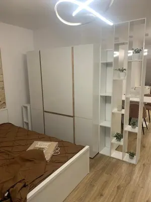 a bedroom with a bed and a glass wall at SOFIA CENTRAL LUXURY apartment 