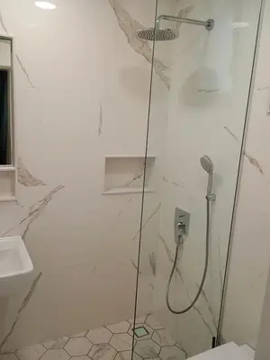 a bathroom with a shower and a sink at Luxury rooms 12-2 in Plovdiv