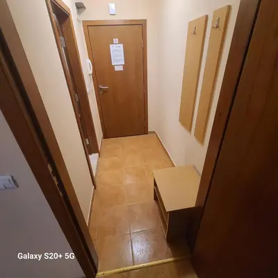 a hallway with a door and a stairway with a door at The Castle Bonko in Pamporovo