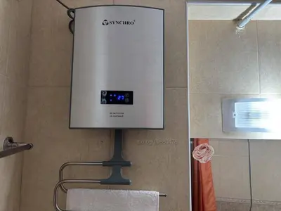 a large screen in the corner of a bathroom at Апартамент за гости 4а26 Планинска Магия Grand Monastery Пампорово in Pamporovo