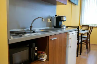 a kitchen with a sink and a counter top at Studio Villa Park 325 in Borovets