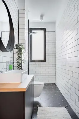 a white bathroom with a sink and a toilet at Sophisticated Gem in the Heart of Sofia in Sofia