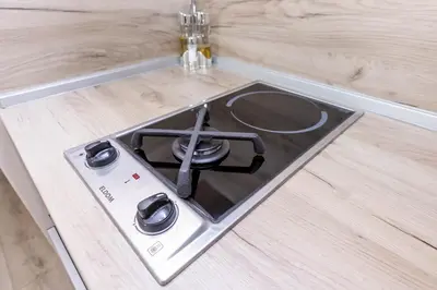 a stove top oven sitting on top of a counter at Topalov in Sandanski