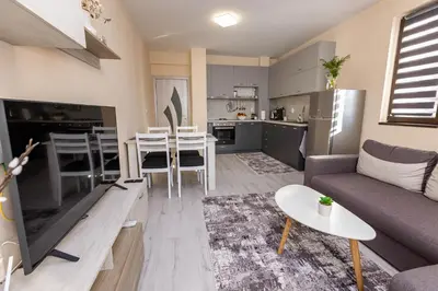 a living room with a couch and a table at Apartment Betty in Sandanski