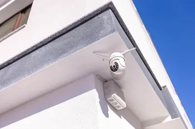 a white door with a security camera on it at Apartment Betty in Sandanski