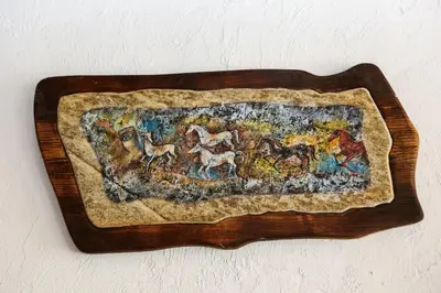 a wooden tray with a painting of horses on it at Delchovski Han in Delchevo