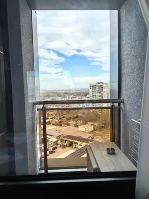 a window with a view of a parking lot at Luxury Apartment/Studio in Plovdiv