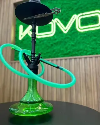 a microphone on a table with a green hose at Hotel Etropol, Center Etropole in Etropole