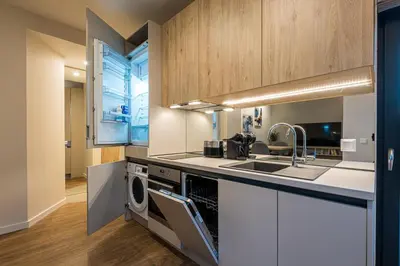 a kitchen with a sink and a dishwasher at North 21 - Brand New Modern 1BD Apt in Sofia Center by Flat Mаnager in Sofia