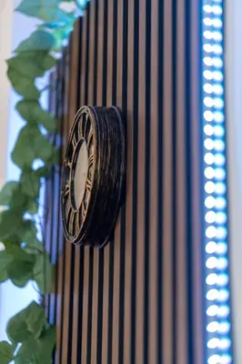a clock on the side of a building at Vintage Home by NDK and Vitosha Blvd with Free Secured Parking in Sofia