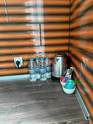 a group of bottles of water sitting on a counter at 2 Bedrooms apartment. in Plovdiv