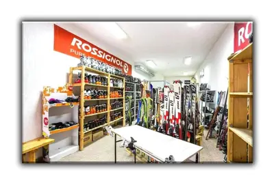 a room filled with lots of skis in a store at Teo and Miki 612 in Pamporovo