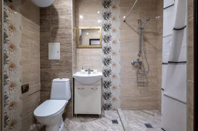 a bathroom with a toilet and a sink and a shower at Cozy Homes 3 in Sofia