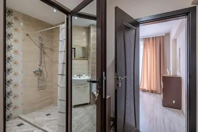 a bathroom with a shower and a sink at Cozy Homes 3 in Sofia