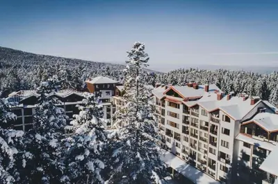 an aerial view of a resort in the snow at Borovets gardens Studio A12 in Borovets