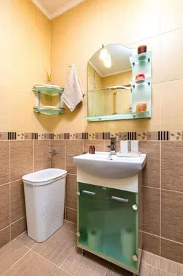 a bathroom with a sink and a mirror at Spacious Central Apt by Stefanie / close to MU in Plovdiv