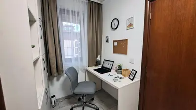 a room with a desk with a laptop and a chair at Very cozy and comfort house in top location in Bansko