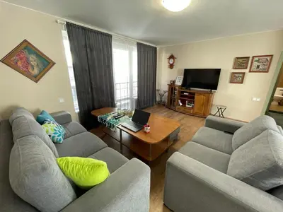 a living room with two couches and a television at NiDo Cozy 3BR Apartment Kapana Top Center in Plovdiv