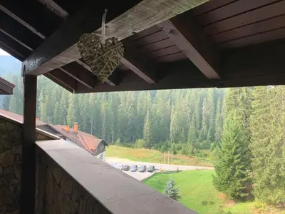 a view from the balcony of a house with a view at 705 in The Stream Resort in Pamporovo