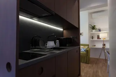 a kitchen with a sink and a counter top at Gorgeous apartment in the perfect area in Sofia