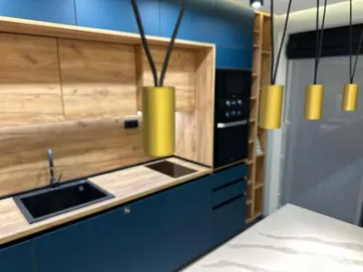 a kitchen with blue cabinets and yellow pendant lights at Regatta Park 2BR Exclusive Suite Parking Included in Plovdiv