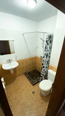 a bathroom with a toilet and a sink at 