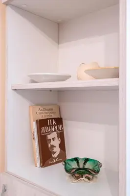 a shelf with a book at Urban Haven Retreat in Sofia