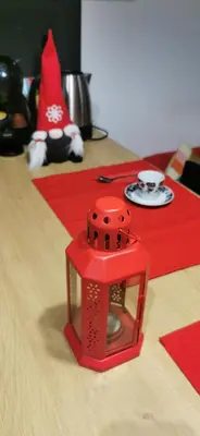 a red object sitting on top of a table at Sunflower in Sofia