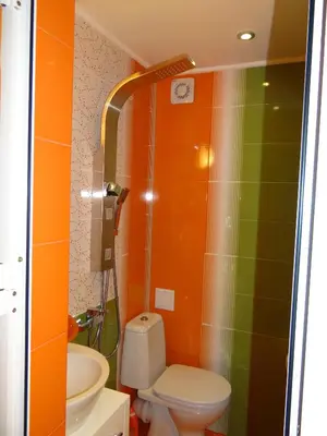 a bathroom with a toilet and a sink at Orange Flower Apartments 1 in Sofia