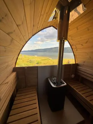 an inside view of a sauna with a window at ЕДЕЛВАЙС Сърница in Sarnitsa
