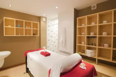 a hospital room with a bed and a sink at Local Stay Villas in Bansko