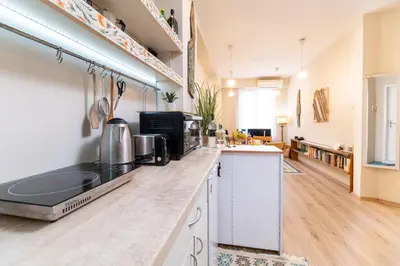 a kitchen with a sink and a counter top at Chic Urban Getaway in City Center by Flat Mаnager in Plovdiv