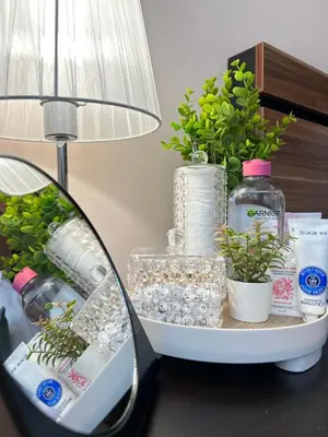 a shelf with toiletries and a lamp on a table at Casa Rea - Comfortable Stay with Free Parking in Sofia