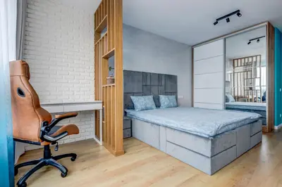 a bedroom with a bed and a desk and a chair at Luxury 2 BDRM Getaway and Free Parking in Sofia