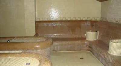 a bathroom with a tub and a toilet and a sink at Ski Lift Apartment in Bansko in Bansko