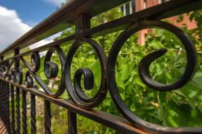 a close up of a black iron fence at Nova Guesthouse - Private En-Suite Rooms I Sofia Center I Self Check-In in Sofia