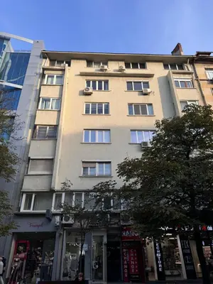a tall building with windows on the side of it at Main Street Sunshine 2 KING Bdr in Sofia