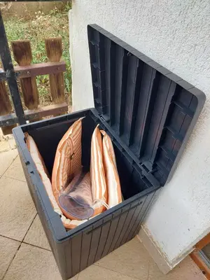 a container full of shoes sitting next to a wall at Villa Victoria in Stoykite