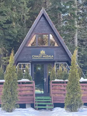 a small building with a sign that reads staff muska at Chalet Musala Borovets by BookVillaBG in Borovets