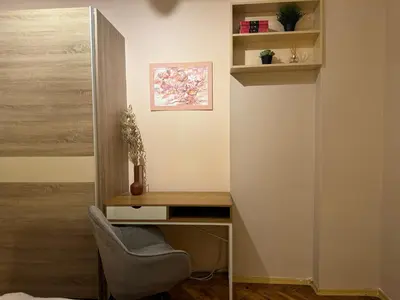 a home office with a desk and a chair at Cozy and quiet central apartment in Sofia
