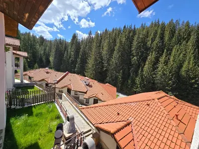 an aerial view of a house with trees at Вила 5 - Планински перли in Stoykite