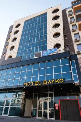 a hotel bayo building with a sign on it at HOTEL BAYKO in Plovdiv
