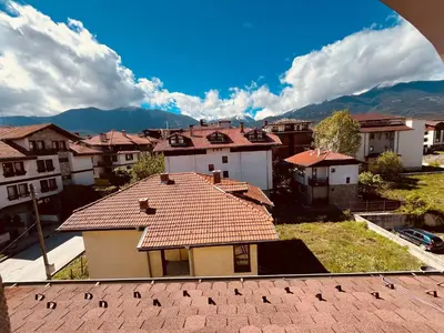 a view from the roof of a building with houses at Marina Apartment - Mountain View in Bansko