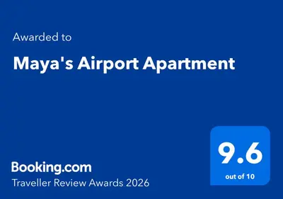 a blue sign with the words mayas airport appointment at Maya's Airport Apartment in Sofia