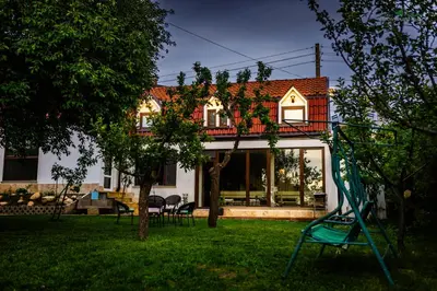 a house with a playground in the yard at Докторската къща in Sapareva Banya