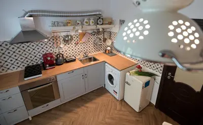 a small kitchen with a sink and a dishwasher at SOTS apART in Sofia center in Sofia