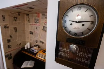 a clock with a face on it in a room at SOTS apART in Sofia center in Sofia