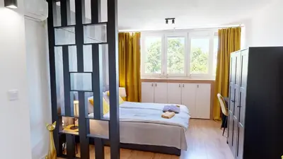 a bedroom with a bunk bed and a window at Modern City Stay apartment 4 min walk from Alexander Nevski in Sofia