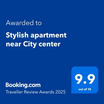 a blue screen with the text awarded to physician appointment near city center at Stylish apartment near City, entire flat, 1 bedroom, 1 large bed in living room in Plovdiv