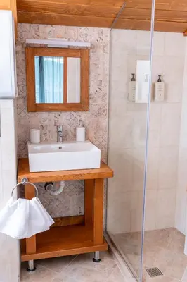 a bathroom with a sink and a shower at Apart house EMA 4 in Bansko